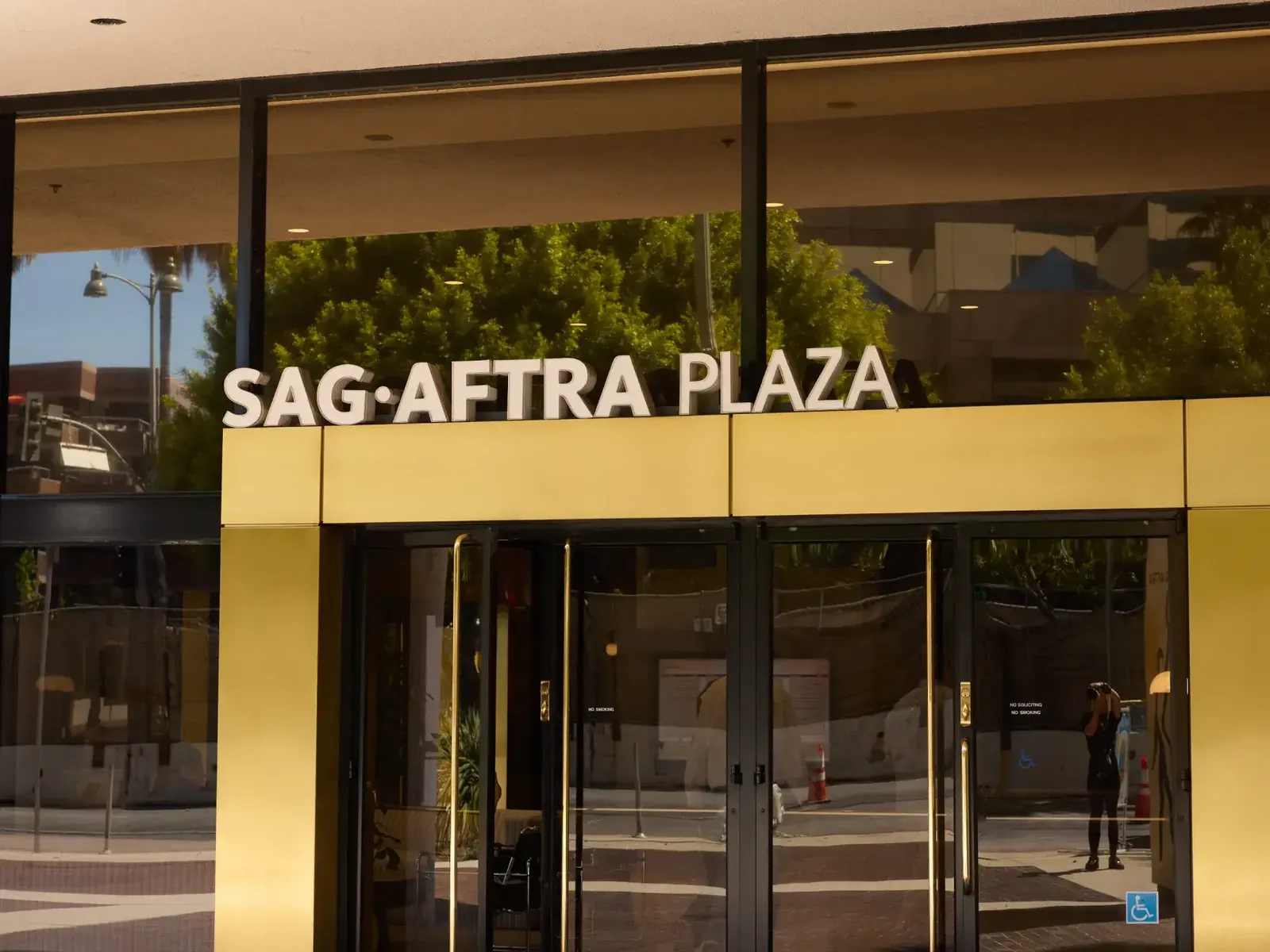 The gold entrance of SAG-AFTRA Plaza on Wilshire Boulevard