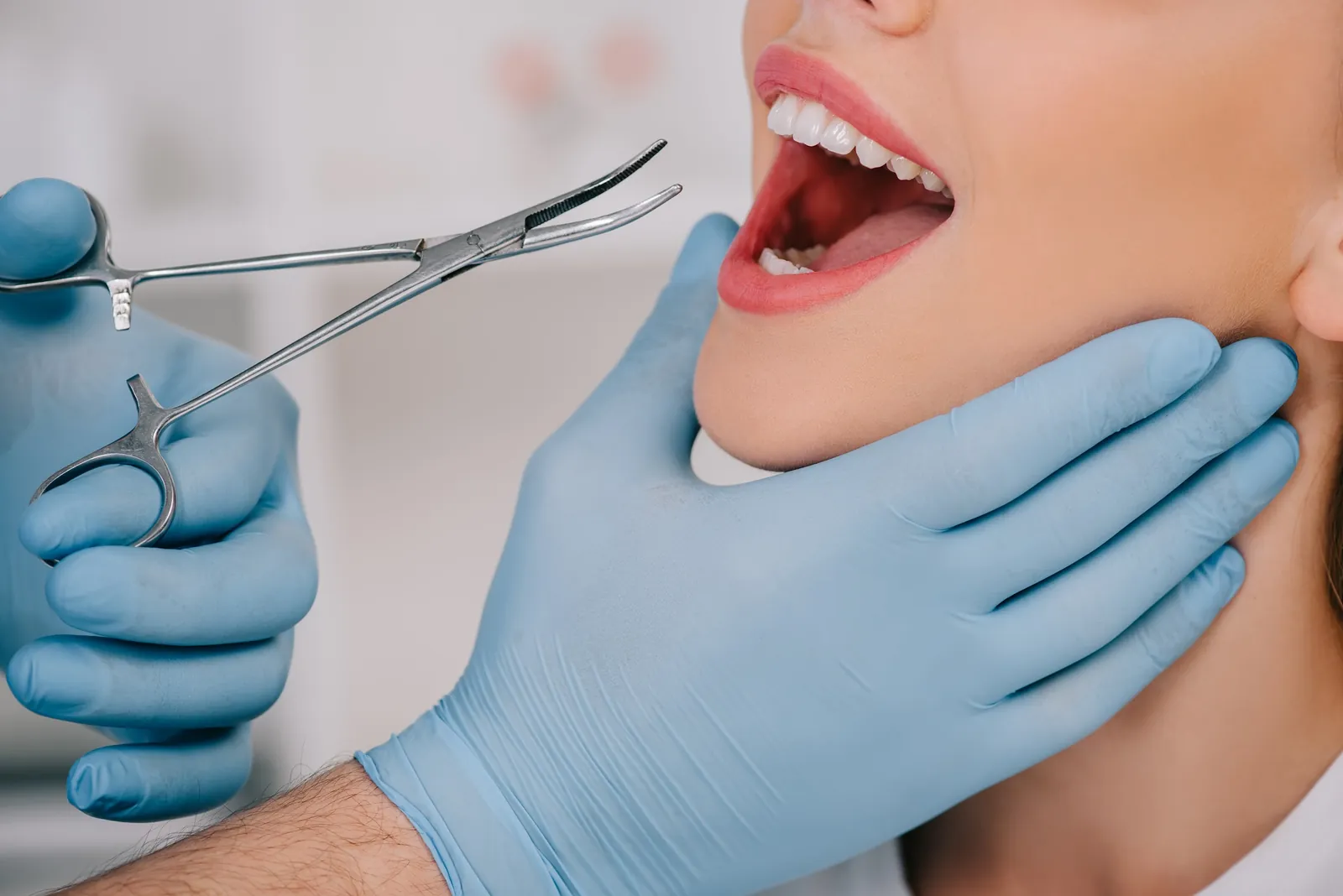 A dentist preparing for an extraction